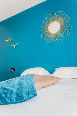 Un ou plusieurs lits dans un hébergement de l'établissement Le Balcon - 2 Chambres