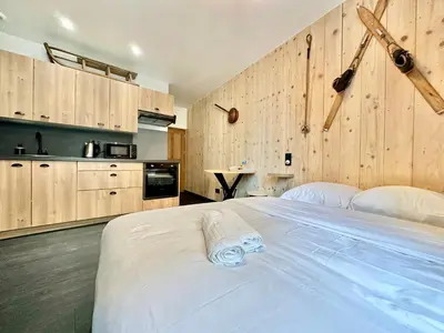 Un ou plusieurs lits dans un hébergement de l'établissement Le Chalet, central et calme