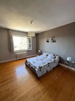 Un ou plusieurs lits dans un hébergement de l'établissement Maison au bord du lac