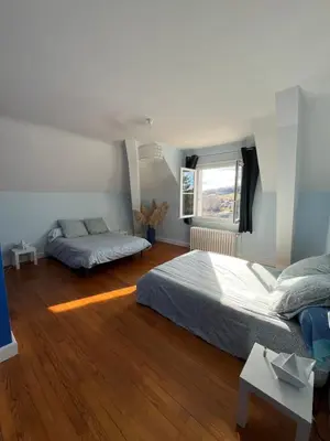 Un ou plusieurs lits dans un hébergement de l'établissement Maison au bord du lac