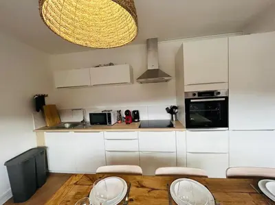 Cuisine ou kitchenette dans l'établissement NEW : Appartement Vue montagne