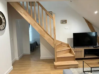 Télévision ou salle de divertissement dans l'établissement Charmant Appt Duplex - 8 Personnes
