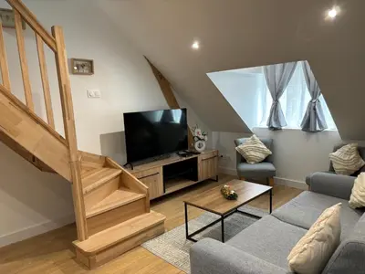 Télévision ou salle de divertissement dans l'établissement Charmant Appt Duplex - 8 Personnes