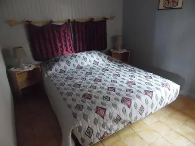 Un ou plusieurs lits dans un hébergement de l'établissement Le Chardonnay - Gîte - Lot (vallée de la Dordogne)