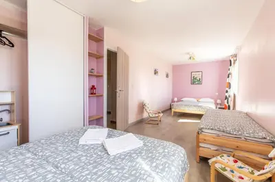 Un ou plusieurs lits dans un hébergement de l'établissement Maison 12 Couchages tout confort - 11B Vialle St Gene