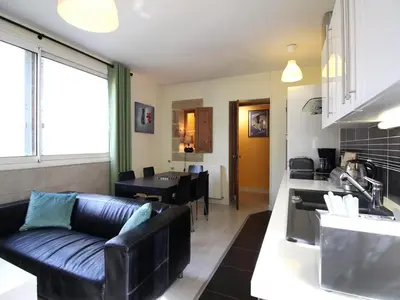 Cuisine ou kitchenette dans l'établissement T3 duplex avec parking à La Bourboule - FR-1-608-269