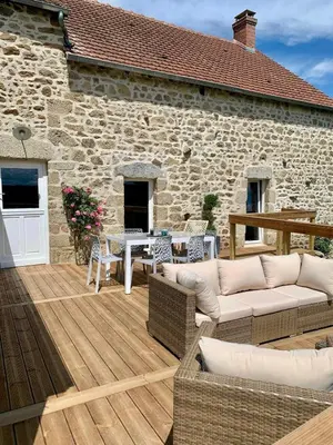 Coin salon dans l'établissement La Bergerie de Chantemille - Chambre d'hôtes familiale les Dahlias - jacuzzi, piscine