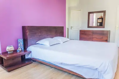 Un ou plusieurs lits dans un hébergement de l'établissement La Villa Lumière - 3 chambres