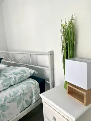 Un ou plusieurs lits dans un hébergement de l'établissement Casa 4 Saisons - Studio à thème - PiscineJardin - Proche centre-ville