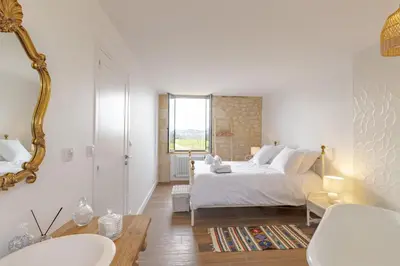 Un ou plusieurs lits dans un hébergement de l'établissement La Résidence Périgourdine Meublé Tourisme 5 étoiles Luxe