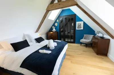 Un ou plusieurs lits dans un hébergement de l'établissement La Résidence Périgourdine Meublé Tourisme 5 étoiles Luxe