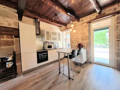 Cuisine ou kitchenette dans l'établissement Gîte de France L'air du paradis 3 épis - Gîte de France 6 personnes MAE-6344