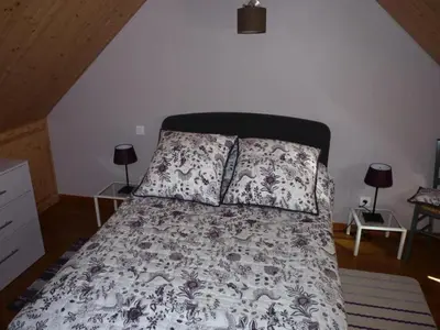 Un ou plusieurs lits dans un hébergement de l'établissement Gîte de France à Sarroux - St Julien 3 épis - Gîte de France 8 personnes MAE-0134