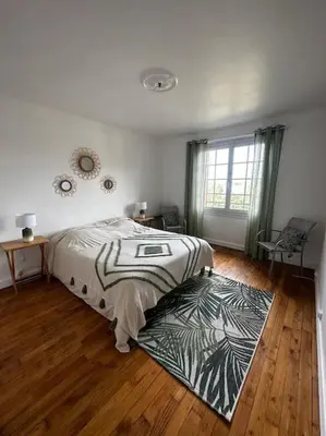 Un ou plusieurs lits dans un hébergement de l'établissement Maison de campagne 5 min A20