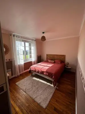 Un ou plusieurs lits dans un hébergement de l'établissement Maison de campagne 5 min A20