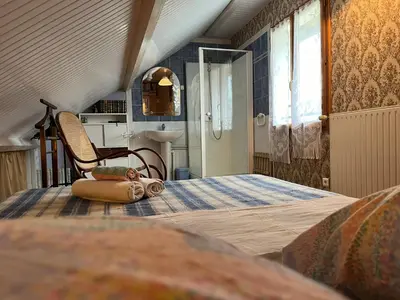 Un ou plusieurs lits dans un hébergement de l'établissement Gite en duplex 4 personnes, Vallée de la Jordanne, Cantal