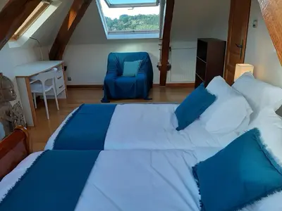 Un ou plusieurs lits dans un hébergement de l'établissement Gite des papous Meublé de tourisme 4 épis
