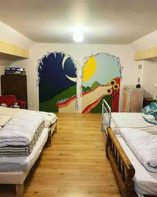 Un ou plusieurs lits dans un hébergement de l'établissement Maison de caractère à Saint-Nectaire le haut