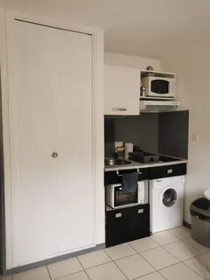 Cuisine ou kitchenette dans l'établissement Studio au pied des pistes et des Cures