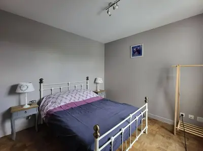 Un ou plusieurs lits dans un hébergement de l'établissement La libellule Pelaude Appartement 4-6 personnes avec terrasse