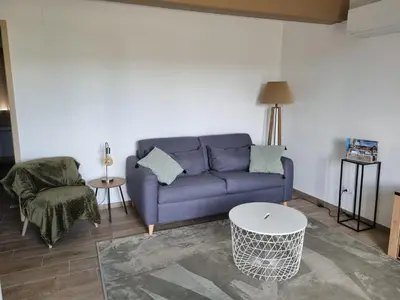 Coin salon dans l'établissement APT T2 à 500M du centre ville