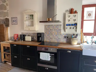 Cuisine ou kitchenette dans l'établissement La Petite Maison à Beaulieu