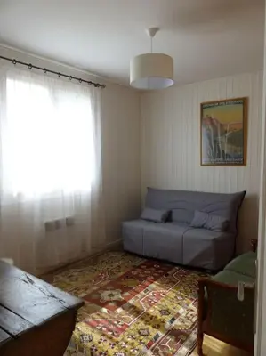 Coin salon dans l'établissement Gîte Les Hauts de Curemonte