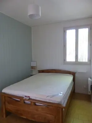 Un ou plusieurs lits dans un hébergement de l'établissement Gîte Les Hauts de Curemonte