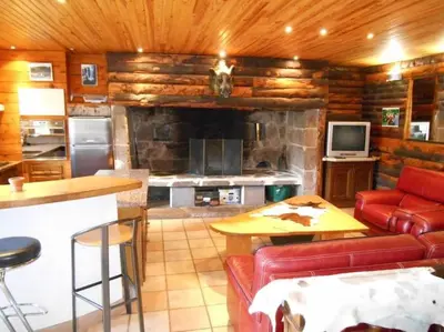 Coin salon dans l'établissement Maison au Giraldès Le Claux Puy Mary Volcan chalet