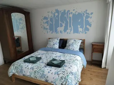 Un ou plusieurs lits dans un hébergement de l'établissement La Ramure, maison de village
