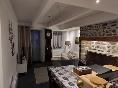 Un ou plusieurs lits dans un hébergement de l'établissement La Ramure, maison de village