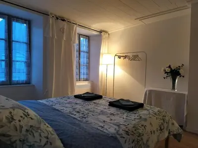 Un ou plusieurs lits dans un hébergement de l'établissement La Ramure, maison de village