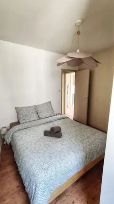 Un ou plusieurs lits dans un hébergement de l'établissement Appartement T2 hyper centre