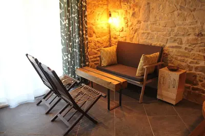 Coin salon dans l'établissement Le Gîte Tranquille Sérénité