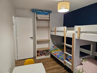 Un ou plusieurs lits dans un hébergement de l'établissement Appartements 4, 5 et 10 personnes rénovés en centre-ville