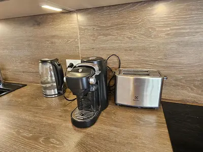 Cuisine ou kitchenette dans l'établissement Appartements 4, 5 et 10 personnes rénovés en centre-ville