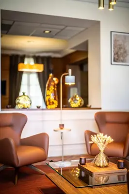 Coin salon dans l'établissement Le Prieuré Corrèze