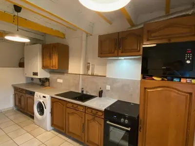Cuisine ou kitchenette dans l'établissement Au coeur des volcans