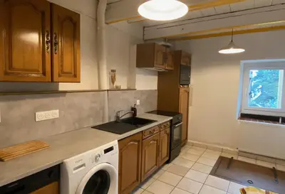 Cuisine ou kitchenette dans l'établissement Au coeur des volcans