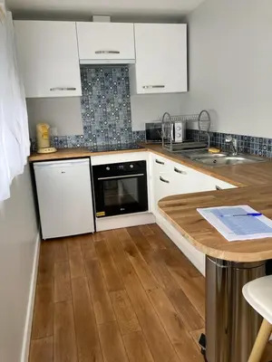 Cuisine ou kitchenette dans l'établissement Logement T2 neuf-évasion en Corrèze