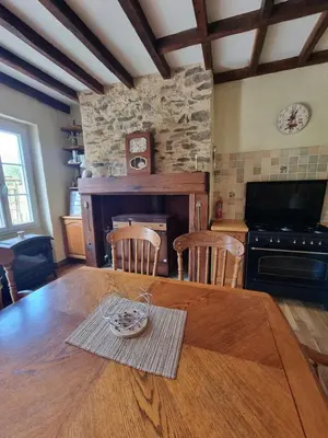 Coin salon dans l'établissement gîte avec piscine et étang Sarrazac Dordogne