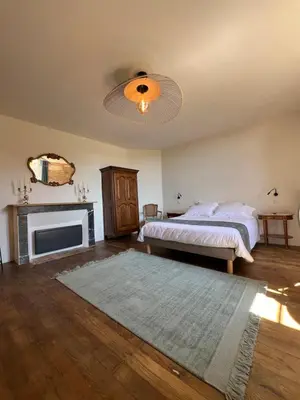 Un ou plusieurs lits dans un hébergement de l'établissement Château d'Aynac