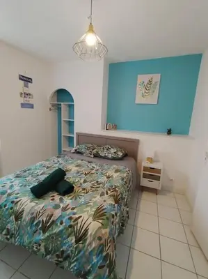Un ou plusieurs lits dans un hébergement de l'établissement appartement 2 Pièces