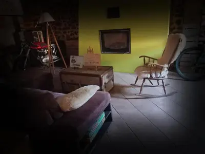 Coin salon dans l'établissement Gite La Voie Romaine