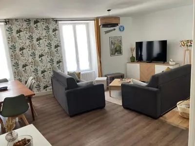 Télévision ou salle de divertissement dans l'établissement Les Chamois du Sancy