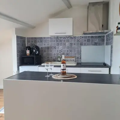 Cuisine ou kitchenette dans l'établissement Mercadial au coeur de Saint-Céré