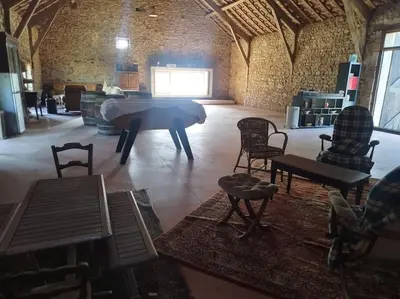 Coin salon dans l'établissement Gîte au gré du vent