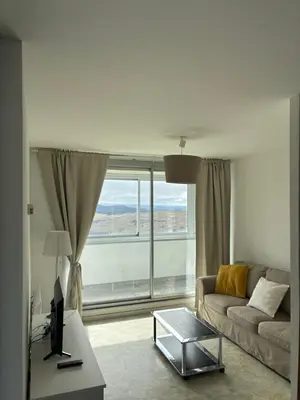 Coin salon dans l'établissement Appartement Super Besse