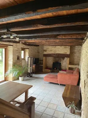 Coin salon dans l'établissement Grande maison type Périgourdine