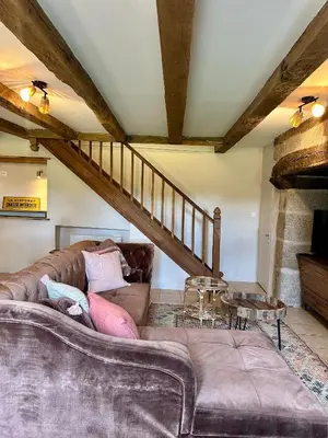 Coin salon dans l'établissement Gîte Le Four à Pain 6 personnes sur le domaine du Manoir du Rigouneix